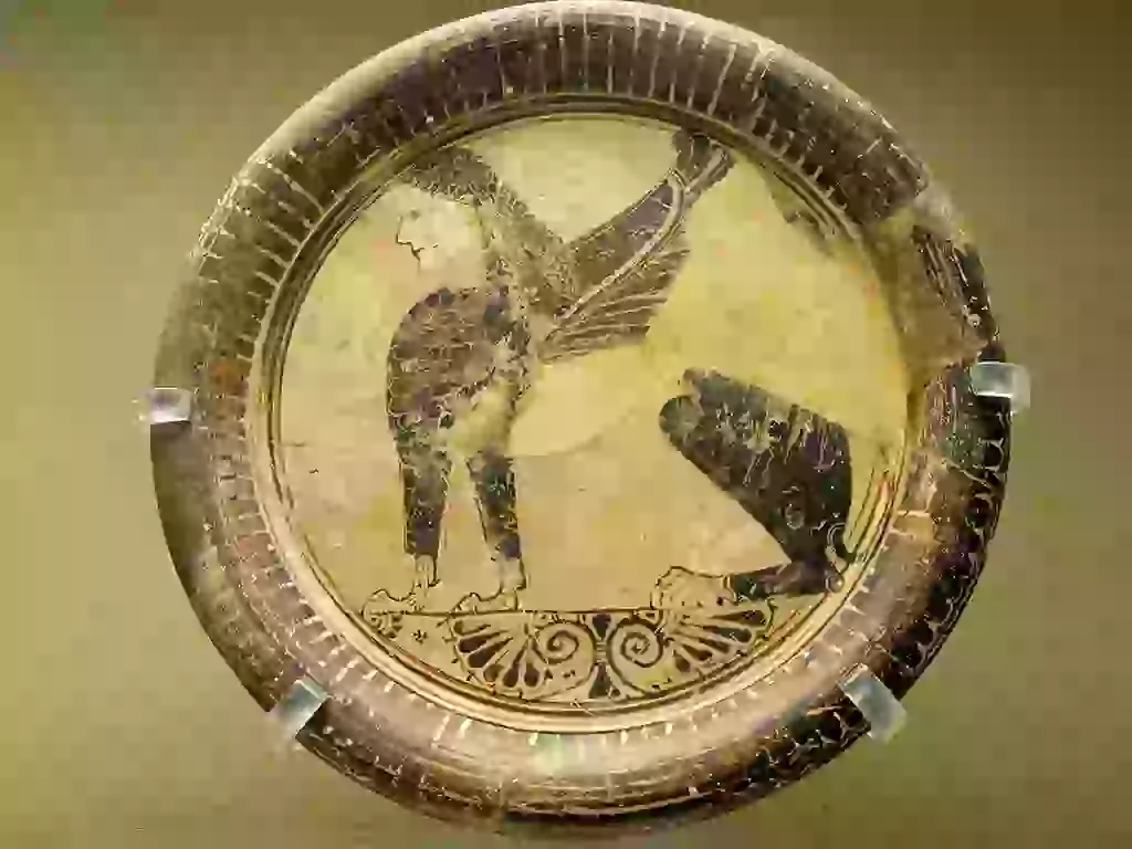 The Greek Emporion of Naukratis c 664 BC - c 700 AD  - Seated sphinx plate, Eastern Greek Orientalizing, 6th century BC, from Naukratis