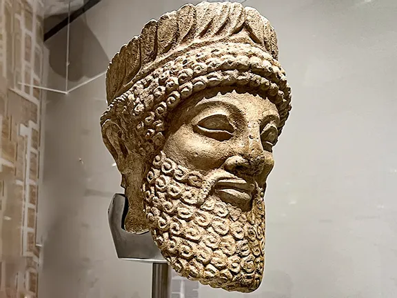 The Invisible Enemy: When Culture Itself Becomes a Target Head of Lamassu - looted from temple