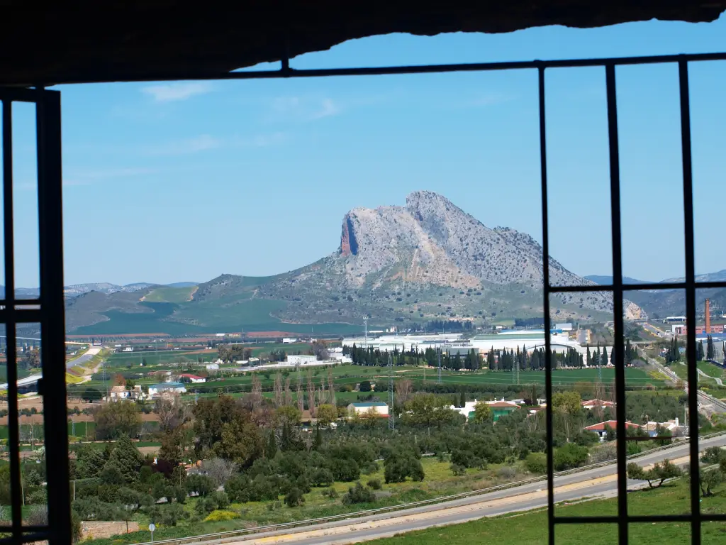 The Architecture of Anxiety: Prehistoric Paranoia in Southern Spain - Peña de los Enamorados as seen from the dolmen Menga